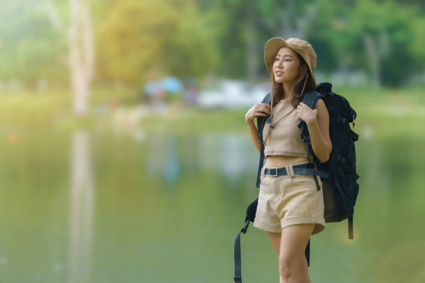 istock Asian young beautiful female backpacker traveling alone. 1801797578