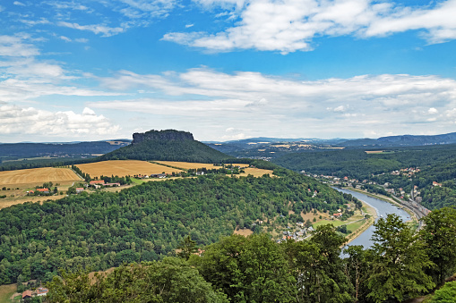 Aerial view of the town Koenigstein and the table mountain Lilienstein at the river Elbe in Saxon Switzerland, Germany.