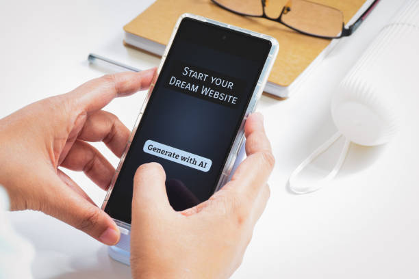 istock Woman hand using a generative AI application on her phone to build a website to start her small business. 1801808514