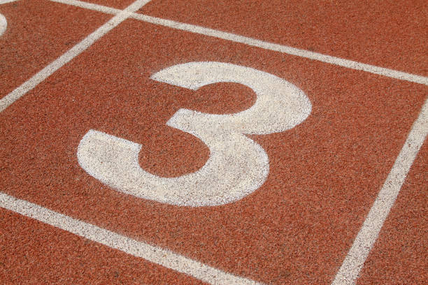 istock red plastic runway in a sports ground 1801821608