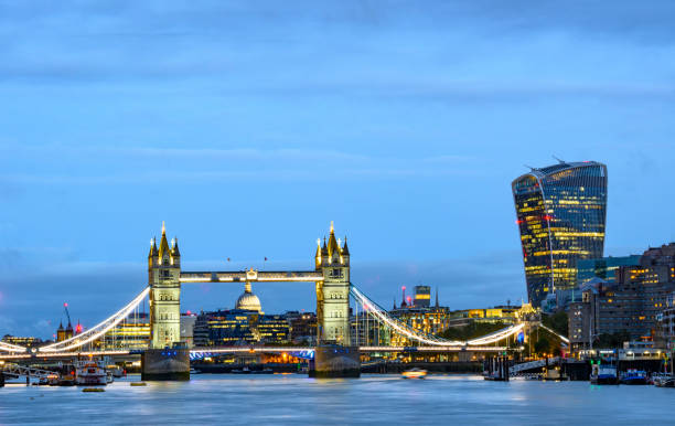 istock Tower Bridge at Sunrise with St Pauls Cathedral, London, UK 1801870147