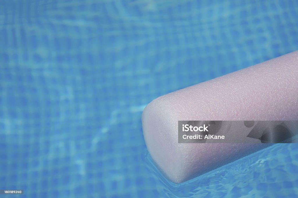 pink noodle pink pool noodle and blue water Noodle Float Stock Photo