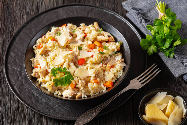 istock Chicken Fried Rice with vegetables in black bowl 1801913175