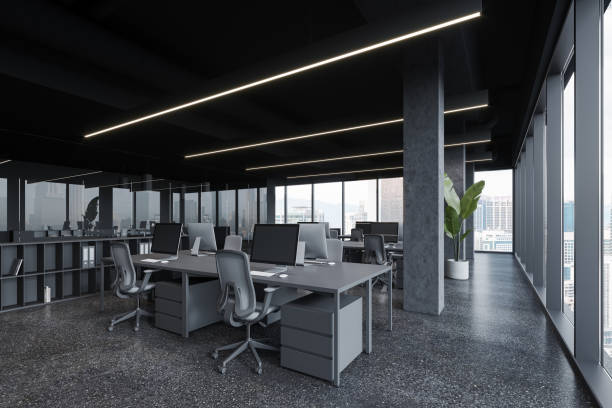 istock Grey coworking interior with pc desktop and glass room, panoramic window 1801925928