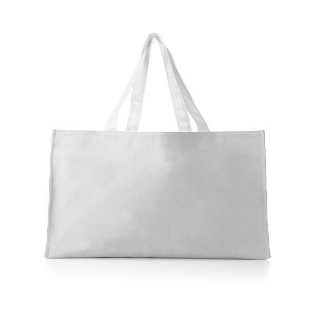 Eco Friendly White Colour Fashion Canvas Tote Bag Isolated on White Background. Reusable Bag for Groceries and Shopping. Design Template for Mock-up. Front View tote bag mock up stock pictures, royalty-free photos & images