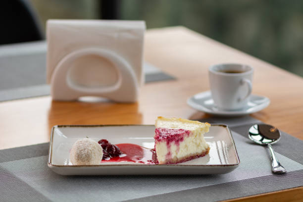 istock Classical New Your Cheese Cake served with berries sauce and freshly coffee. 1801927986