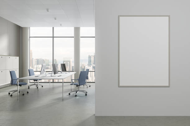 istock White office business room interior with table and computers. Mockup frame 1801932169