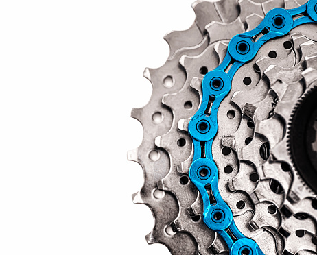 bicycle chain on MTB cassette on white
