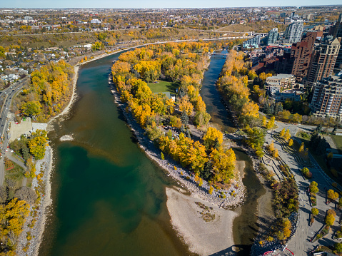 Prince's Island Park autumn foliage scenery. Aerial view of Downtown City of Calgary, Alberta, Canada.