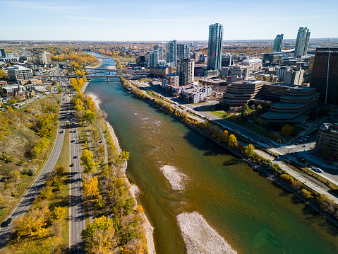 Downtown Calgary and Bow River and Memorial Drive in autumn season. Aerial view of City of Calgary, Alberta, Canada.