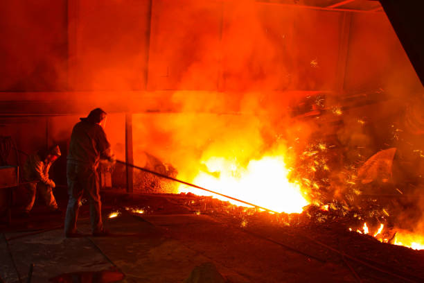 istock iron works blast furnace taphole spewing molten iron 1801974811