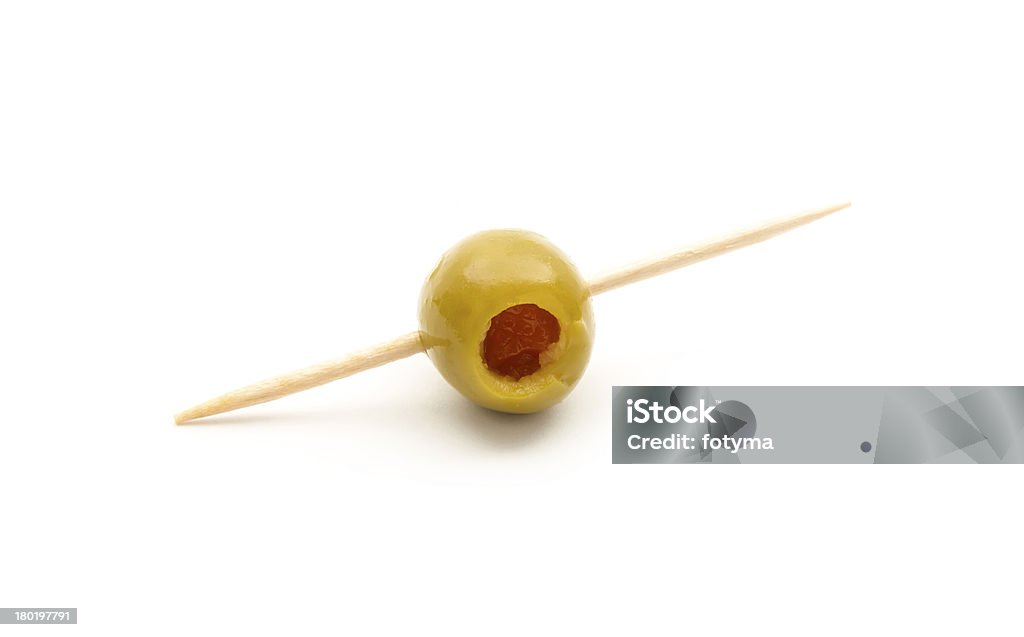 olives green olive with toothpick isolated on white background Olive - Fruit Stock Photo