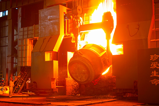 TANGSHAN - JUNE 20: converter plus iron material in iron and steel co., on June 20, 2014, Tangshan city, Hebei Province, China