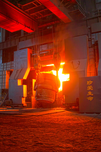 TANGSHAN - JUNE 20: converter plus iron material in iron and steel co., on June 20, 2014, Tangshan city, Hebei Province, China