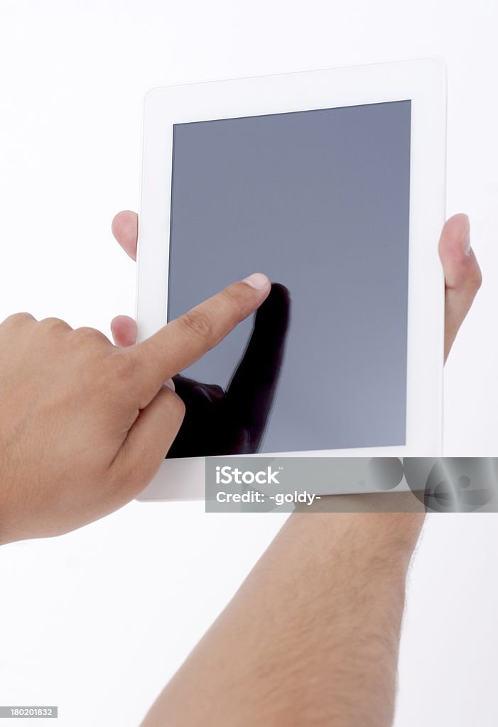 À l'aide d'une tablette numérique blanc - Photo de Tablette numérique libre de droits
