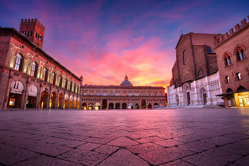 Cityscape image of old town Bologna, Italy with Piazza Maggiore at beautiful autumn sunrise.