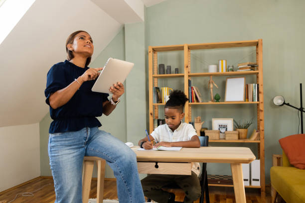 istock Woman turning on home devices using smart home system 1802039419