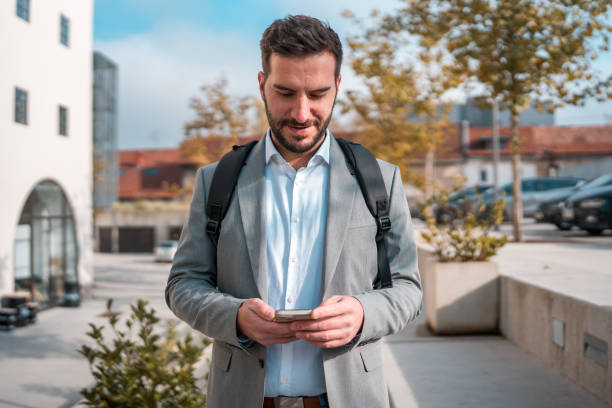 istock Caucasian Man Mobile Banking on the Go 1802053724