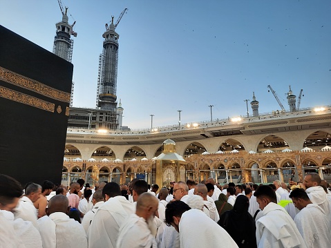 At the time of Maghrib prayer, Pilgrims from different countries are present for tawaf in the inner courtyard of Masjid Al Haram in Mecca.