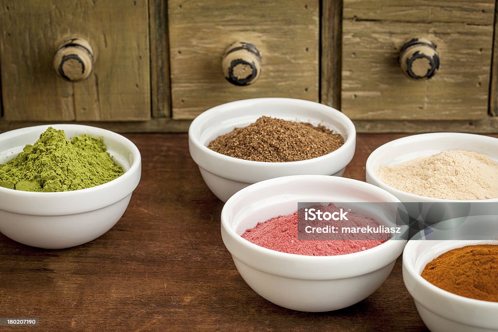 super fruit and leaf powders super fruit and leaf powders in small ceramic bowls - baobab, noni, yumberry, moringa, mangosteen Antioxidant Stock Photo