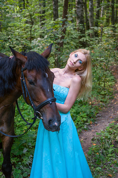 istock Pretty girl and a horse 180208270