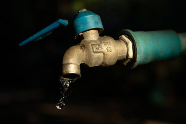 istock Silver faucet with water drops 1802090333