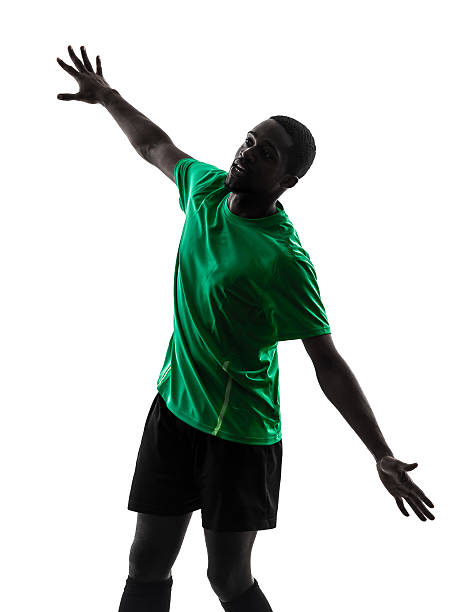 One African Man Soccer Player Celebrating Victory Green Jersey In