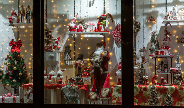 istock Christmas items displayed in a shop window at night 1802120223