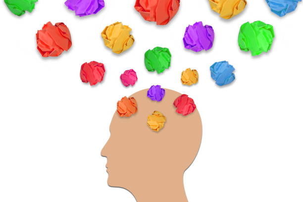istock Mental health and problems with memory. Crumpled papers and human head silhouette. 1802132678