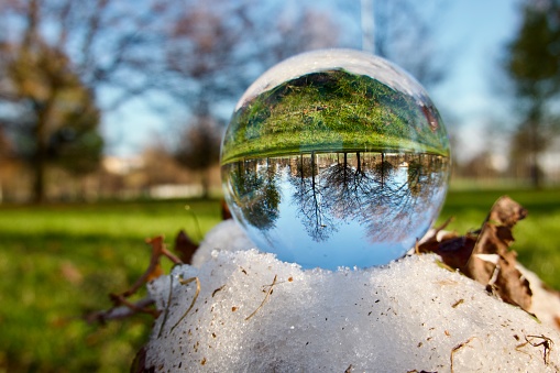 Crystal ball on snow during autumn