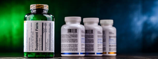istock Composition with dietary supplement containers. Drug pills 1802159953