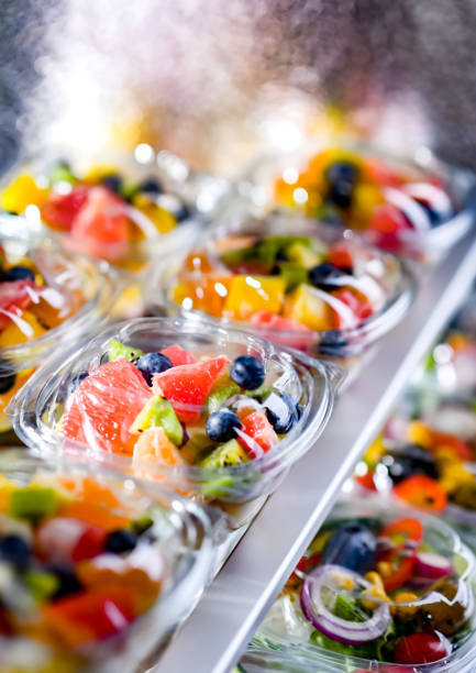 istock Boxes with pre-packaged fruit salads in a commercial fridge 1802161043