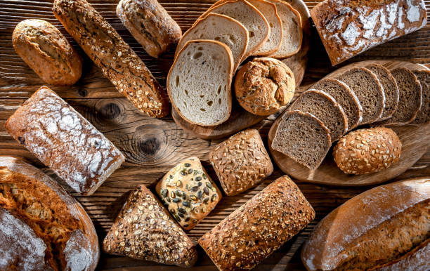 istock Assorted bakery products including loaves of bread and rolls 1802162238