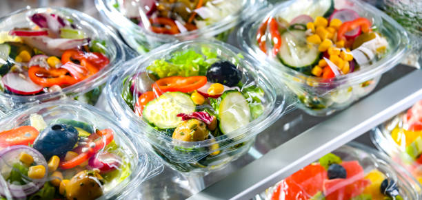 istock Boxes with fruit and vegetable salads in a commercial fridge 1802162830