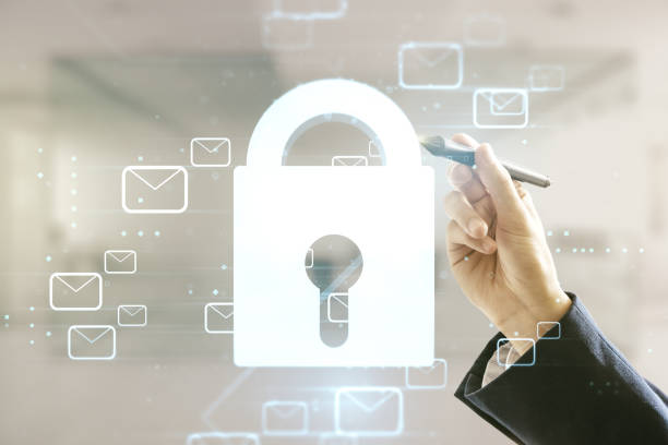 istock Man hand with pen working with abstract virtual lock symbol and postal envelopes illustration on blurred office background. Protection and firewall concept. Multiexposure 1802167748