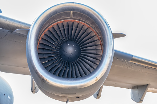 Close up detail with a large jet engine.