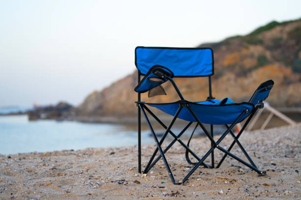 istock camping chair on the beach 1802193795