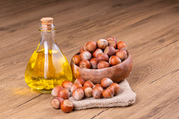 istock Shelled hazelnuts and hazelnut oil 1802211207