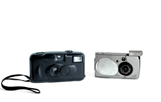 istock Two old retro cameras isolated on a white background. 1802225190