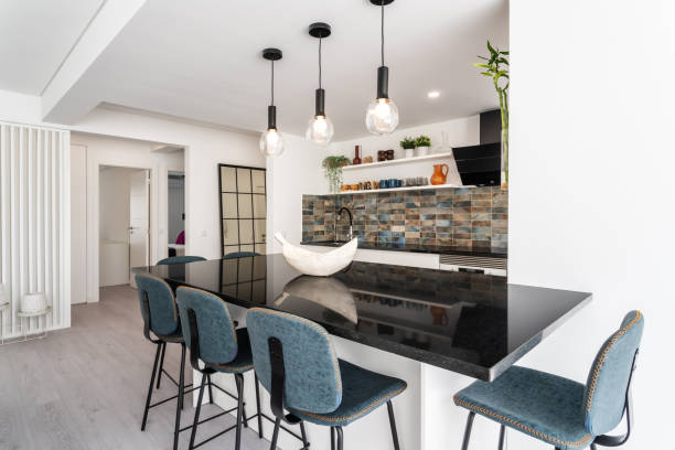 istock Beautiful kitchen in luxury home with marble table and chairs. modern decor and high-end style 1802239971