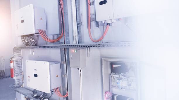 istock Check and Service Instalation control of inverters solar panel on the wall. 1802267068