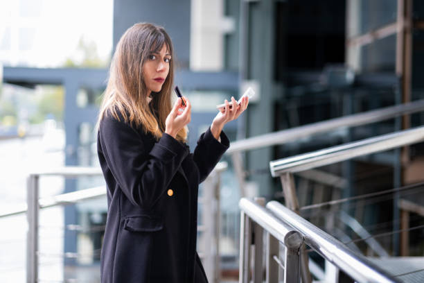 City chic, red lips, corporate ambiance.