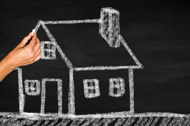 istock House on chalkboard,real estate concept 1802290530