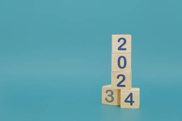 istock Vertical woodblocks cubes square with number 2023 change to 2024 1802291628