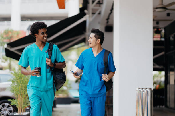 istock Healthcare workers walking to work 1802298003