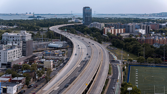 New Jersey Turnpike leading to the Hudson River waterfront with the Statue of Liberty in the distance