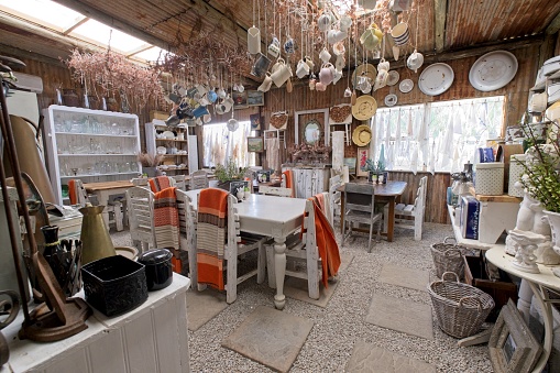 Eastern Cape Province, South Africa - September 09, 2019 : interior view displaying kitchen furniture and wares at Daniell African Crafts farm stall on route from Kirkwood and Jansenville.