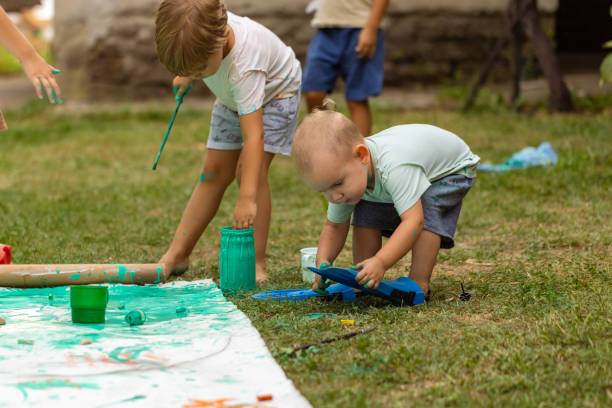 istock Childs drawing outdoors 1802325596