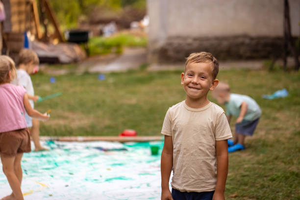 Child drawing outdoors
