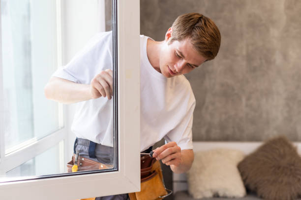 istock A repairman fixing windows in new apartment 1802346295
